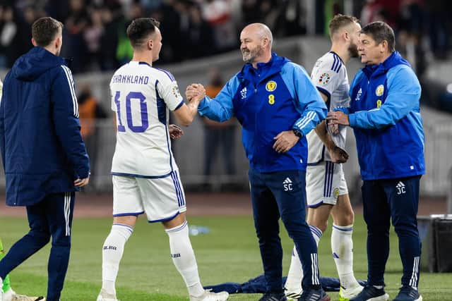 Scotland manager Steve Clarke congratulates Lawrence Shankland after his equaliser secured a 2-2 draw in the Boris Paichadze Dinamo Arena against Georgia on Thursday (Photo by Craig Williamson / SNS Group)
