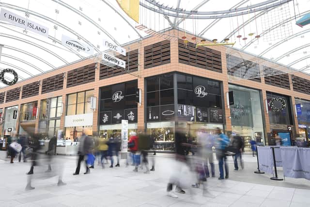 Shoppers in Livingston, which is billed as a key retail destination in Scotland, with 60 per cent of the population located within a one-hour travel time. Picture: Greg Macvean.