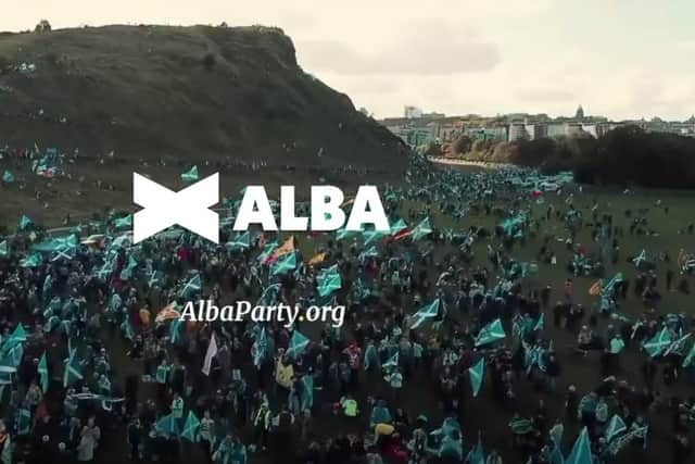 Mr Salmond introduced a video package that showed a large crowd of people waving Saltires - which appeared to be green instead of blue - on Arthur’s Seat in Edinburgh.
