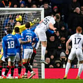 Ross County's Jordan White scores against Rangers for the fifth time in seven appearances in Saturday's 2-1 defeat at Ibrox. (Photo by Rob Casey / SNS Group)