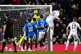 Ross County's Jordan White scores against Rangers for the fifth time in seven appearances in Saturday's 2-1 defeat at Ibrox. (Photo by Rob Casey / SNS Group)