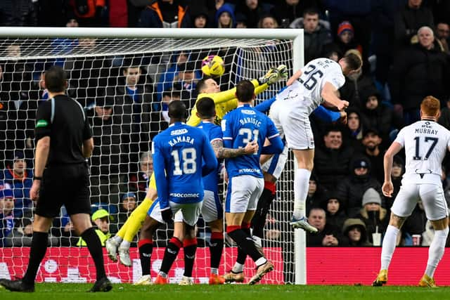 Ross County's Jordan White scores against Rangers for the fifth time in seven appearances in Saturday's 2-1 defeat at Ibrox. (Photo by Rob Casey / SNS Group)