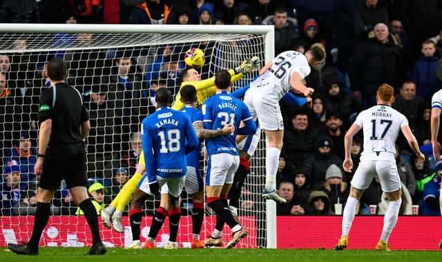 Ross County's Jordan White scores against Rangers for the fifth time in seven appearances in Saturday's 2-1 defeat at Ibrox. (Photo by Rob Casey / SNS Group)