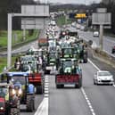 Farmers drive their tractors on the ring road of Rennes, western France, on February 1 (Photo by SEBASTIEN SALOM-GOMIS/AFP via Getty Images)