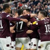 Lawrence Shankland celebrates with team-mates after scoring his and Hearts' second against Hibs at Tynecastle. (Photo by Ross Parker / SNS Group)