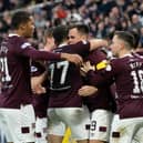 Lawrence Shankland celebrates with team-mates after scoring his and Hearts' second against Hibs at Tynecastle. (Photo by Ross Parker / SNS Group)