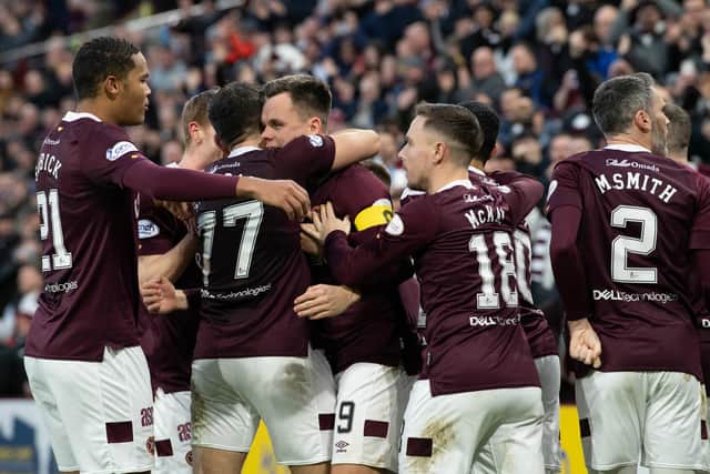 Lawrence Shankland celebrates with team-mates after scoring his and Hearts' second against Hibs at Tynecastle. (Photo by Ross Parker / SNS Group)