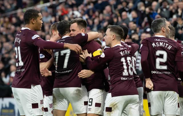 Lawrence Shankland celebrates with team-mates after scoring his and Hearts' second against Hibs at Tynecastle. (Photo by Ross Parker / SNS Group)