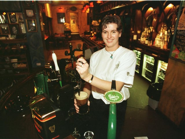 Fibber Magees won the Evening News Pub of the year in 1996. Bar person Katherline Guthrie is pictured pulling a pint.