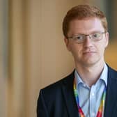 Scottish Green party's Ross Greer heads to the main chamber for Portfolio Questions at the Scottish Parliament in Holyrood, Edinburgh.