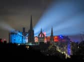Lights from Edinburgh Castle's 'Castle of Light' event illuminate the city skyline. The tourist sector in Scotland has been badly hit by the emergence of the Omicron variant, with events such as Edinburgh's Hogmanay festivities cancelled. Picture: Jane Barlow/PA Wire