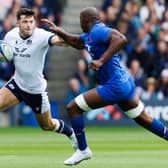 Blair Kinghorn (left) in action for Scotland against Cameron Woki of France during the Summer Nations Series match at Scottish Gas Murrayfield. Scotland won 25-21 and the side will play against in Saint-Etienne on August 12.  (Photo by Ross Parker / SNS Group)