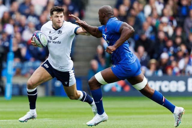 Blair Kinghorn (left) in action for Scotland against Cameron Woki of France during the Summer Nations Series match at Scottish Gas Murrayfield. Scotland won 25-21 and the side will play against in Saint-Etienne on August 12. (Photo by Ross Parker / SNS Group)