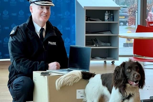Assistant Chief Constable Andy Freeburn and digital evidence detection dog Zen. Photo: Police Scotland/PA Wire
