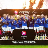 The Rangers players celebrate winning the Viaplay Cup.