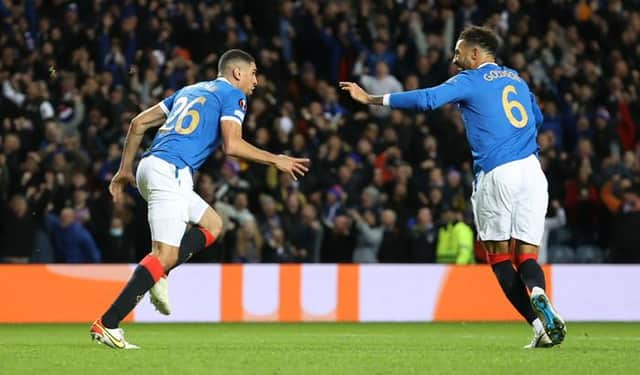 Connor Goldson (right) celebrates with Leon Balogun (left) after Rangers' opening goal in the 2-0 Europa League win over Brondby at Ibrox on Thursday night. (Photo by Craig Williamson / SNS Group)