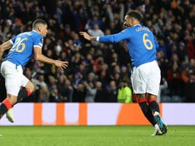 Connor Goldson (right) celebrates with Leon Balogun (left) after Rangers' opening goal in the 2-0 Europa League win over Brondby at Ibrox on Thursday night. (Photo by Craig Williamson / SNS Group)