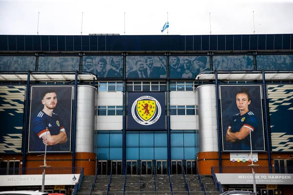 The Saltire is lowered to half mast at Hampden Park as all professional football matches are suspended following the death of Queen Elizabeth II. (Photo by Craig Williamson / SNS Group)