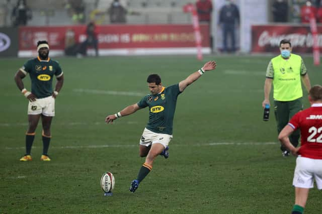 Finn Russell, far right, watches on as Morne Steyn of South Africa kicks the winning penalty in the third Test against the Lions. Also pictured are Springboks captain Siya Kolisi, left, and South Africa's director of rugby Rassie Erasmus on water-carrying duties. Picture: EJ Langner/Gallo Images