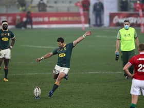 Finn Russell, far right, watches on as Morne Steyn of South Africa kicks the winning penalty in the third Test against the Lions. Also pictured are Springboks captain Siya Kolisi, left, and South Africa's director of rugby Rassie Erasmus on water-carrying duties. Picture: EJ Langner/Gallo Images