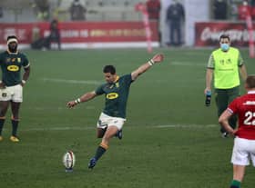 Finn Russell, far right, watches on as Morne Steyn of South Africa kicks the winning penalty in the third Test against the Lions. Also pictured are Springboks captain Siya Kolisi, left, and South Africa's director of rugby Rassie Erasmus on water-carrying duties. Picture: EJ Langner/Gallo Images