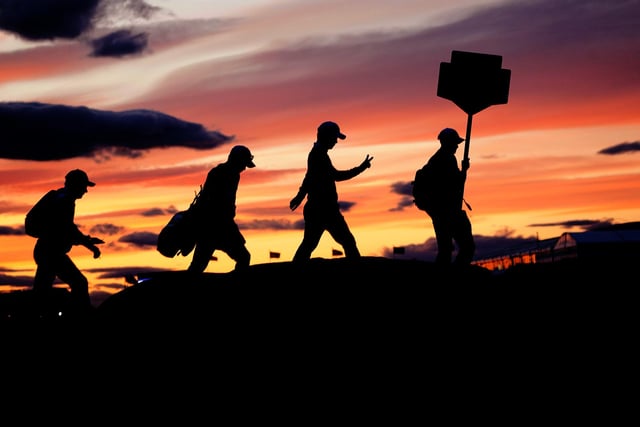 File photo dated 14/07/22. Jane Barlow was at The Open at St Andrews to catch an atmospheric shot of the silhouettes of South Korean golfer Mingyu Cho and his caddy just before they lost the light.
Jane said: “This picture was taken at around 10.30pm as the very last group crossed the famous Swilcan Bridge on the 18th, and they just managed to complete their round in time before the low light stopped play.”