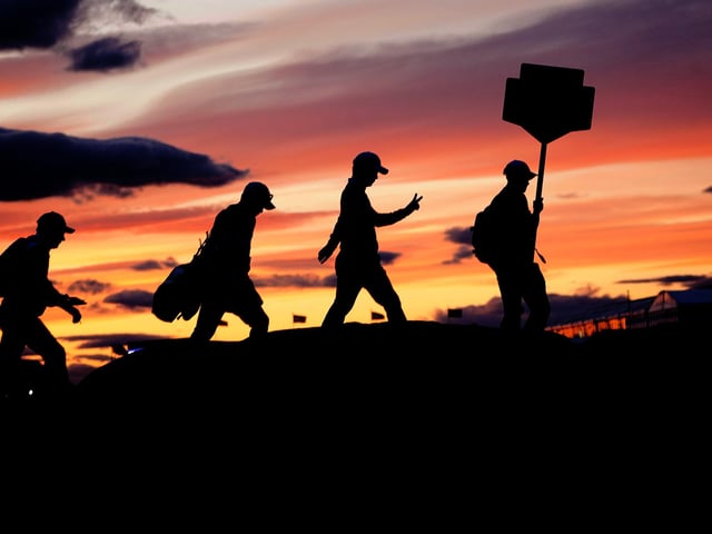 File photo dated 14/07/22. Jane Barlow was at The Open at St Andrews to catch an atmospheric shot of the silhouettes of South Korean golfer Mingyu Cho and his caddy just before they lost the light.

Jane said: “This picture was taken at around 10.30pm as the very last group crossed the famous Swilcan Bridge on the 18th, and they just managed to complete their round in time before the low light stopped play.”