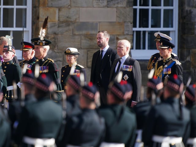 King Charles III (second left), the Princess Royal (centre), the Duke of York (second right) and the Earl of Wessex (right) watch as Queen Elizabeth II's coffin is removed from the Palace of Holyroodhouse at the start of the procession to St Giles' Cathedral, Edinburgh.