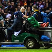 Scotland's Jamie Ritchie goes off injured during the win over England at BT Murrayfield.  (Photo by Ross MacDonald / SNS Group)