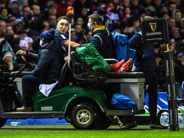 Scotland's Jamie Ritchie goes off injured during the win over England at BT Murrayfield.  (Photo by Ross MacDonald / SNS Group)