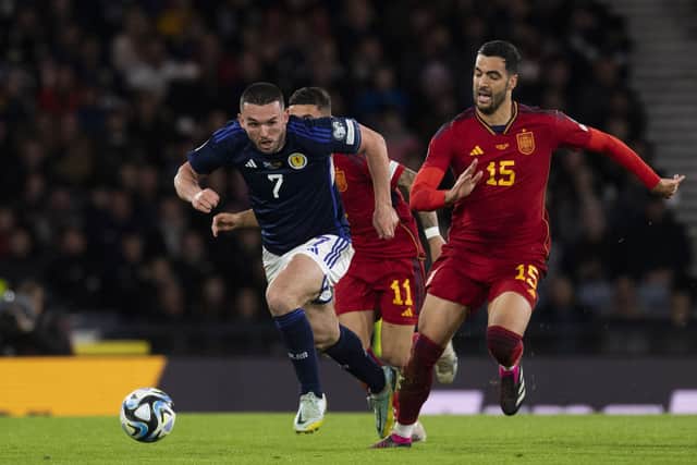 John McGinn leads the charge during Scotland's win over Spain at Hampden in March. (Photo by Craig Foy / SNS Group)