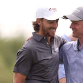 Ryder Cup captain Luke Donald, right, congratulates Tommy Fleetwood, captain of Great Britain and Ireland, after winning his singles match on the last day of the Hero Cup in Abu Dhabi. Picture: Oisin Keniry/Getty Images.