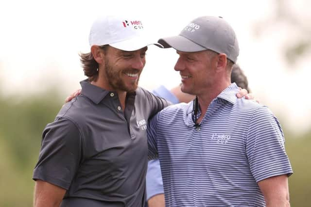 Ryder Cup captain Luke Donald, right, congratulates Tommy Fleetwood, captain of Great Britain and Ireland, after winning his singles match on the last day of the Hero Cup in Abu Dhabi. Picture: Oisin Keniry/Getty Images.