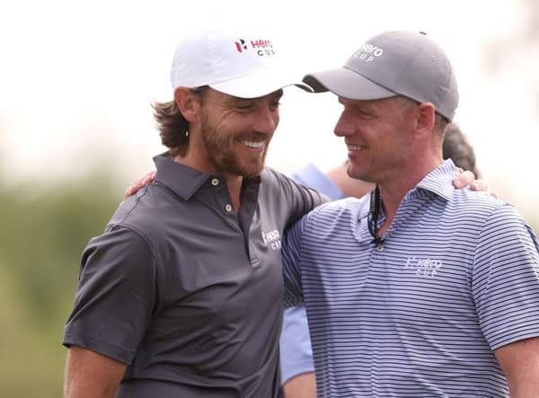 Ryder Cup captain Luke Donald, right, congratulates Tommy Fleetwood, captain of Great Britain and Ireland, after winning his singles match on the last day of the Hero Cup in Abu Dhabi. Picture: Oisin Keniry/Getty Images.