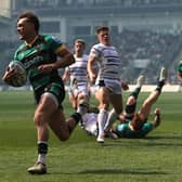 George Furbank of Northampton Saints breaks clear to score their first try during the 90-0 rout of Gloucester.