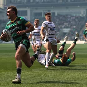 George Furbank of Northampton Saints breaks clear to score their first try during the 90-0 rout of Gloucester.