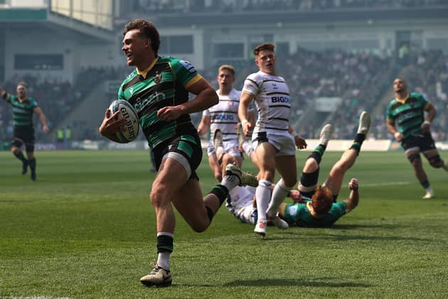 George Furbank of Northampton Saints breaks clear to score their first try during the 90-0 rout of Gloucester.