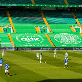 Both sets of players stand together in solidarity against racism ahead of the Scottish Premiership match between Celtic and Rangers at Celtic Park. (Photo by Craig Williamson / SNS Group)