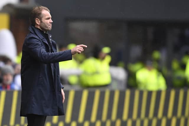 Hearts manager Robbie Neilson issues instructions from the stand.