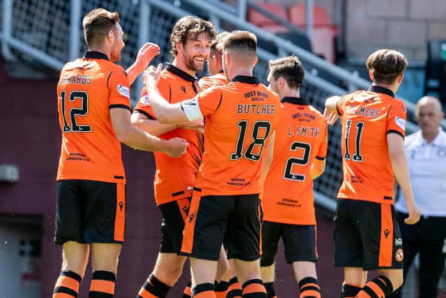 Charlie Mulgrew celebrates after scoring what proved to be Dundee United's winner in the Premier Sports Cup clash with Arbroath at Tannadice. (Photo by Ross MacDonald / SNS Group)