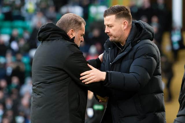 Dundee United manager Tam Courts (right) shakes hands with Celtic boss Ange Postecoglou at full-time. (Photo by Craig Foy / SNS Group)