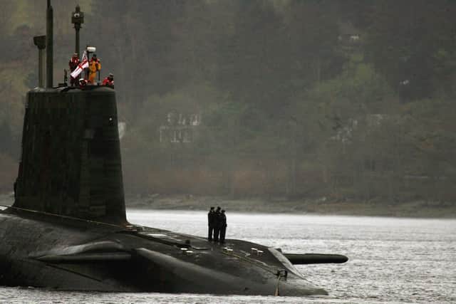 Vladimir Putin needs to be kept in check by the threat from Nato's nuclear deterrent, including the submarines based at Faslane (Picture: Jeff J Mitchell/Getty Images)