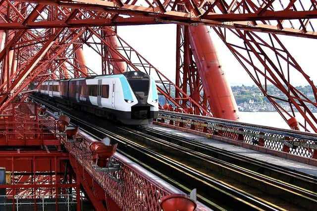 A visualisation of a Siemens hydrogen train crossing the Forth Bridge. (Photo by Siemens Mobility)