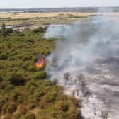 Handout grab from video issued by Luke Channings of the scene after a fire at Dartford Marshes. Issue date: Tuesday July 19, 2022.