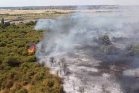 Handout grab from video issued by Luke Channings of the scene after a fire at Dartford Marshes. Issue date: Tuesday July 19, 2022.