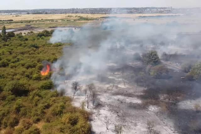 Handout grab from video issued by Luke Channings of the scene after a fire at Dartford Marshes. Issue date: Tuesday July 19, 2022.