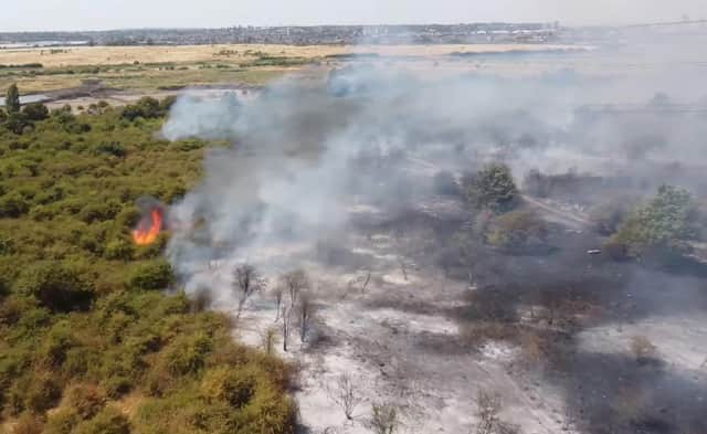 Handout grab from video issued by Luke Channings of the scene after a fire at Dartford Marshes. Issue date: Tuesday July 19, 2022.