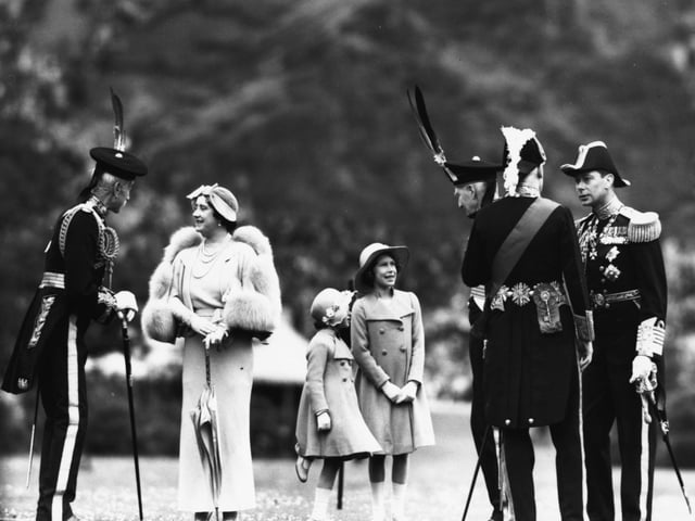 Lord Elphinstone greeting the British Royal Family (left-right) Queen Elizabeth the Queen Mother, Princess Margaret, Princess Elizabeth and King George VI at Holyrood Palace on July 5, 1937.