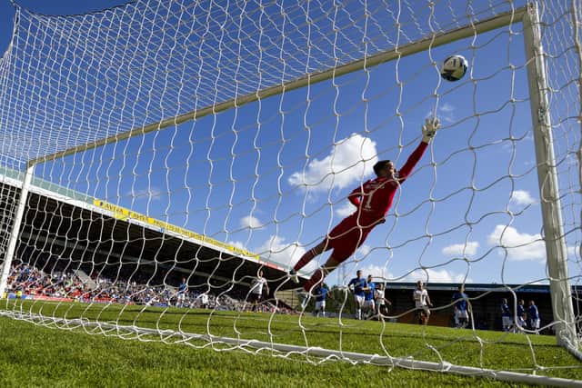 Aberdeen's Leighton Clarkson scores a free kick to make it 1-0 against St Johnstone.
