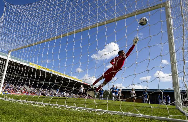 Aberdeen's Leighton Clarkson scores a free kick to make it 1-0 against St Johnstone.